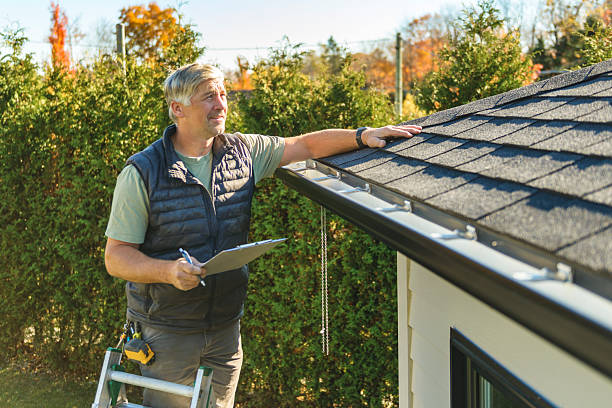 Professional Roofing technician working in Lee, NH